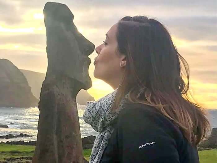 Gaynor at sunset with the Moai Statues of Easter Island