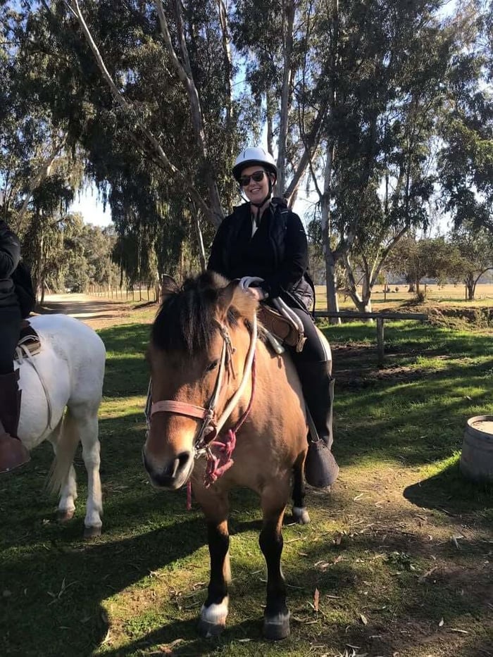 Gaynor on horseback in the wine region of Chile