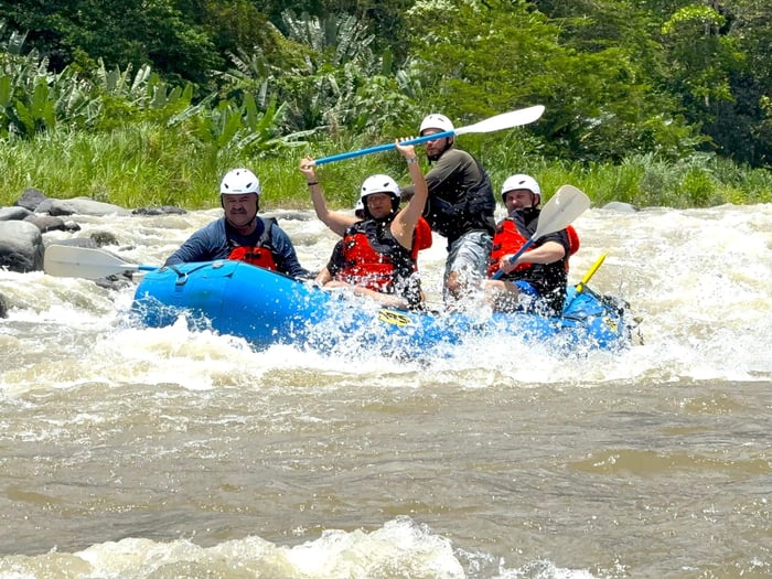 Chelsea and the team exploring the Pacuare River by white water rafting