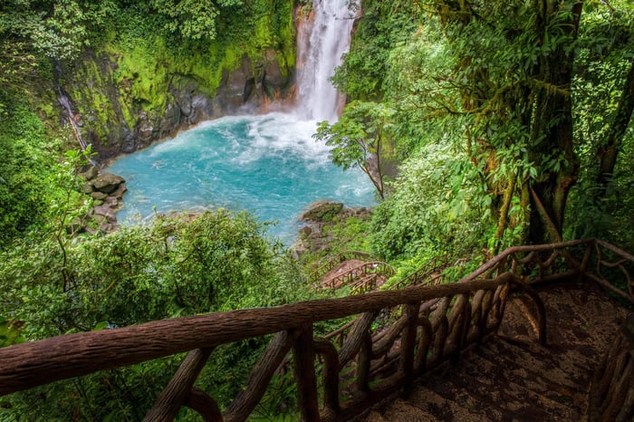 Stairs path that leads to the famous turquoise waters of Rio Celeste river, Tenorio national park, Costa Rica