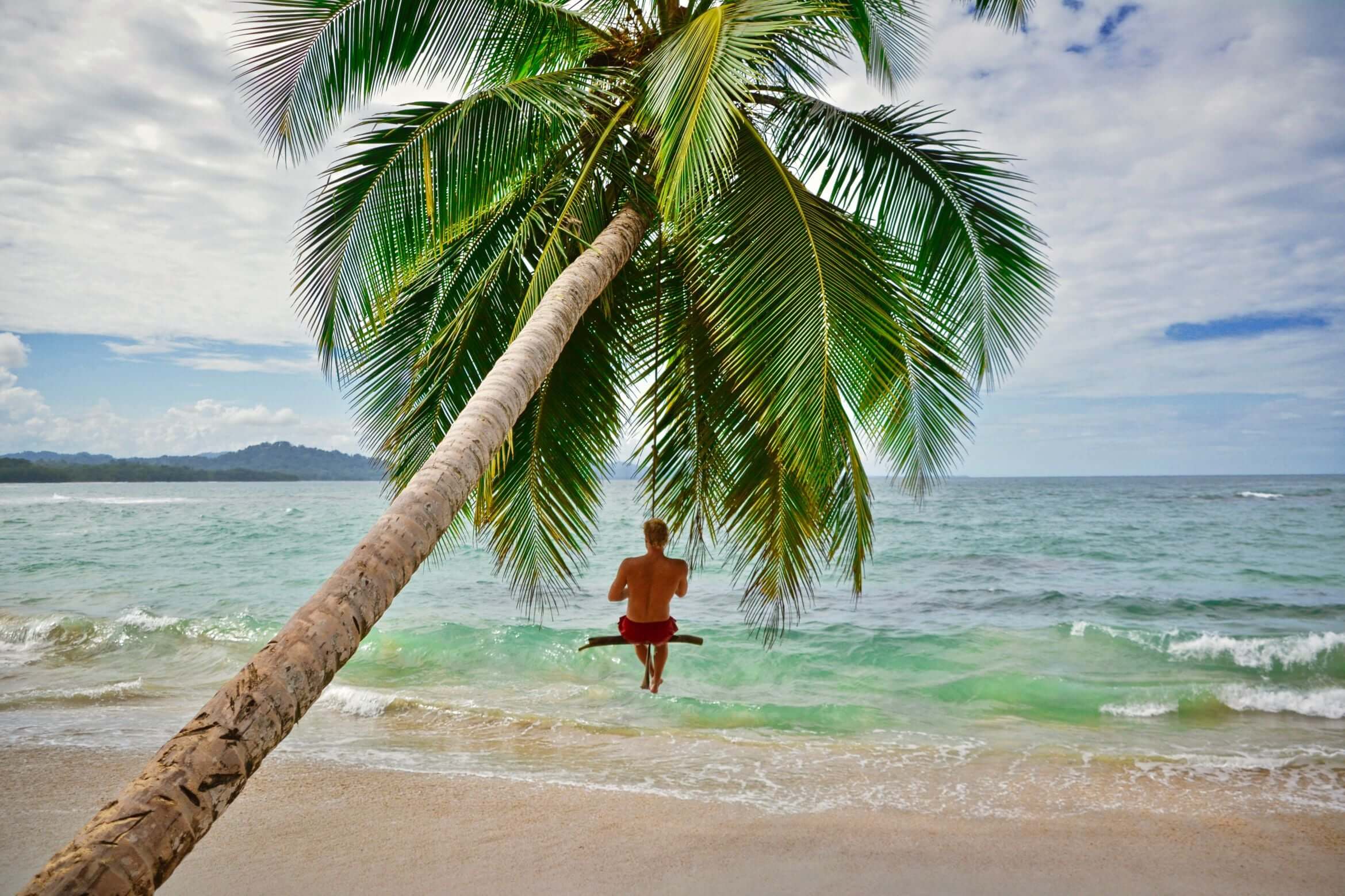 On a swing along the beach in Costa Rica