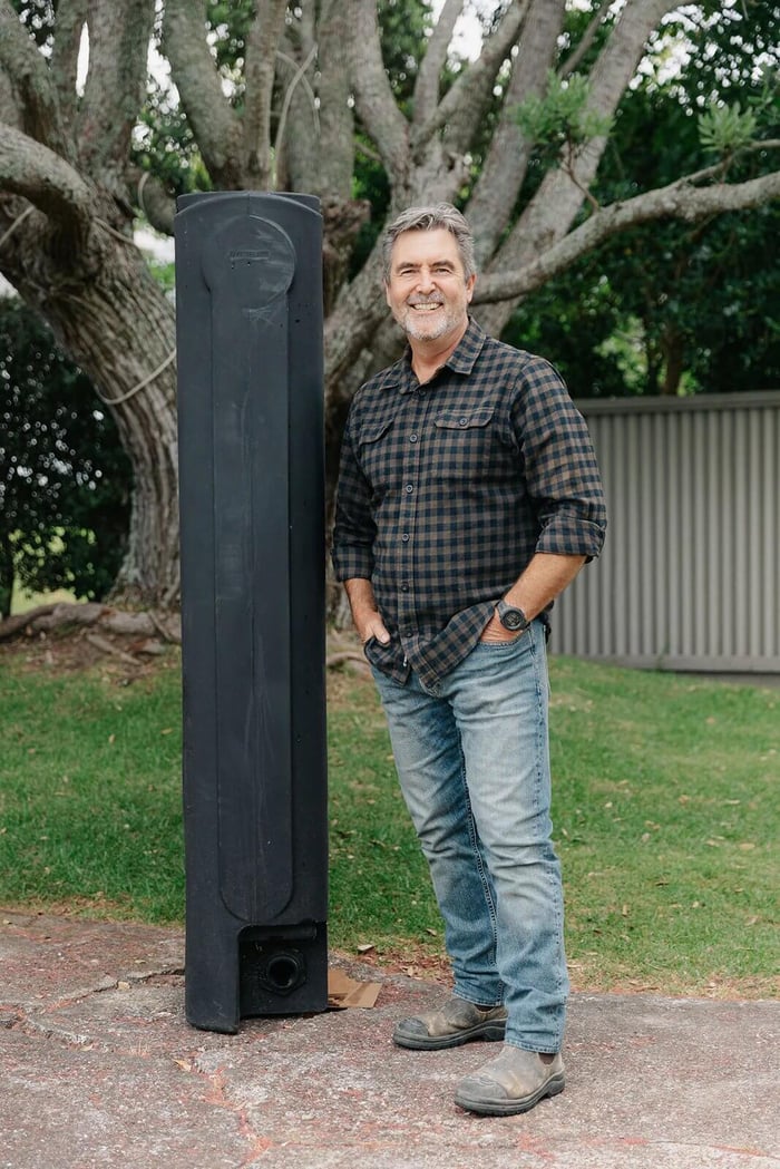 peter stands next to the bailey slimjim slimline tank