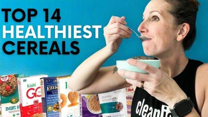A photo of lacey eating cereal with a blue background behind her. White and black text saying top 14 healthiest cereals with branded cereal boxes in the background. Featured image for Best Healthy Cereals post.