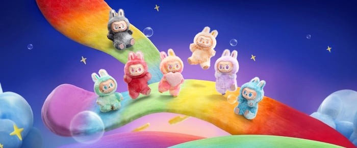 Seven Labubu plushies  on a colourful, rainbow backdrop sprinkled with bubbles and stars.
