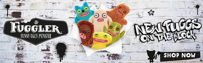 Colorful lineup of quirky Fuggler plush toys with unique facial expressions displayed on a collector's shelf.