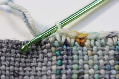 Finish wonky edges of your weaving with single crochet - find more great tips on the Woolery blog!