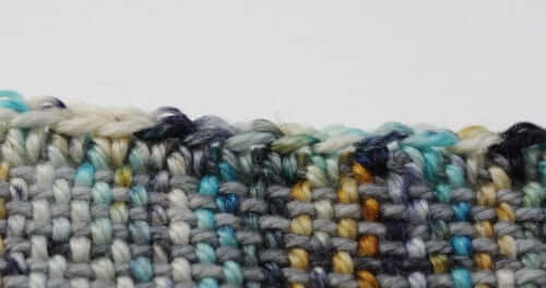 Finish wonky edges of your weaving with single crochet - find more great tips on the Woolery blog!