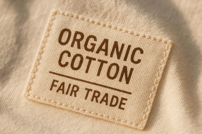 Close-up of premium stitching on fair trade clothing highlighting ethical craftsmanship and quality