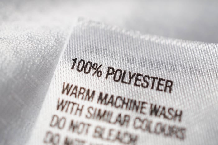 Polyester clothing tag highlighting synthetic fabrics in is Tencel fabric toxic comparison
