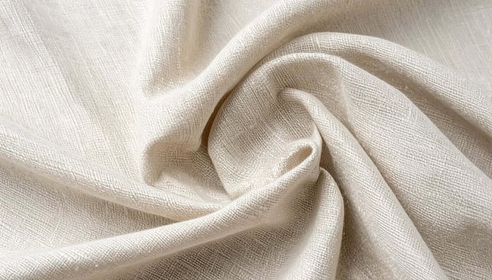 close-up of TENCEL™ Lyocell fabric showing natural wrinkle texture and soft fiber surface