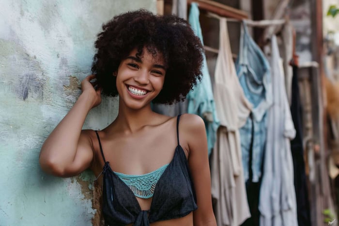Woman wearing minimalist fair trade women's clothing in a timeless, ethically made outfit featuring clean lines, sustainable fabrics, and a modern, conscious fashion aesthetic.