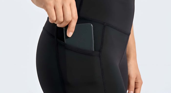 Female yoga pants with pockets designed for convenience, comfort, and performance during workouts
