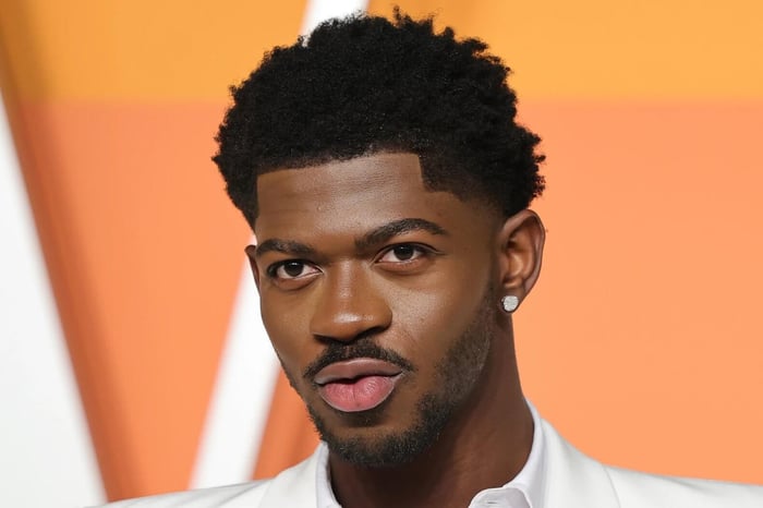 Lil Nas X wearing bold, expressive outfit showcasing Gen Z fashion and modern streetwear style