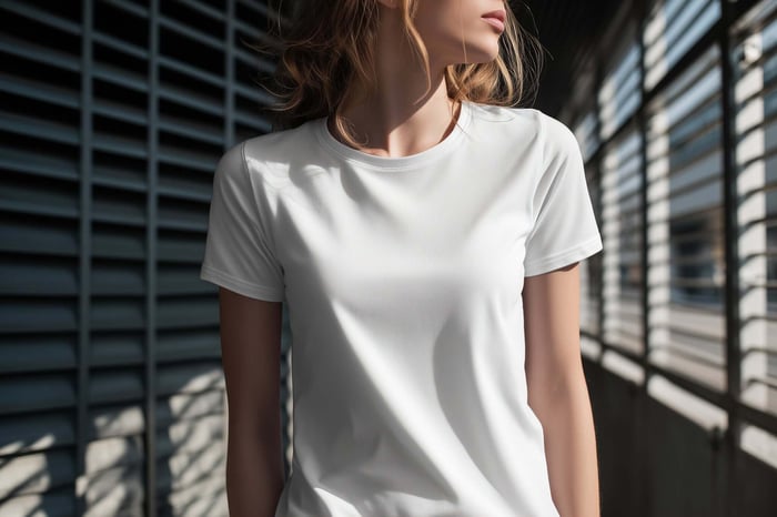 Model wearing a TENCEL™ tee styled with minimal streetwear fashion, featuring a clean silhouette, soft sustainable fabric, and a modern urban aesthetic.