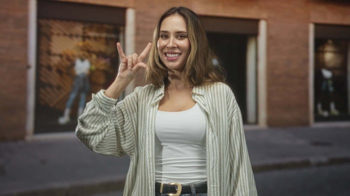 Woman layering a lightweight Tencel top for breathable and versatile sustainable styling