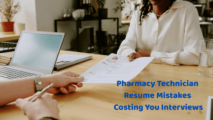 A pharmacy technician handing a résumé to an interviewer across a desk, symbolizing common pharmacy technician resume mistakes that can cost candidates interviews.