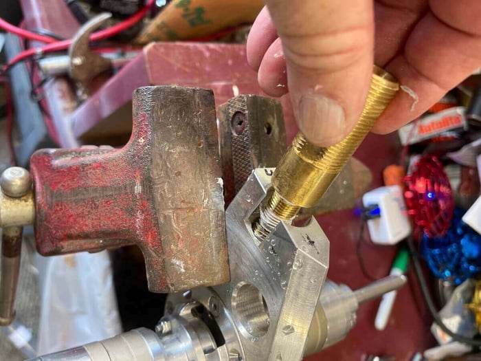 Removing the brass jet fitting from a ProTool water powered brush assembly