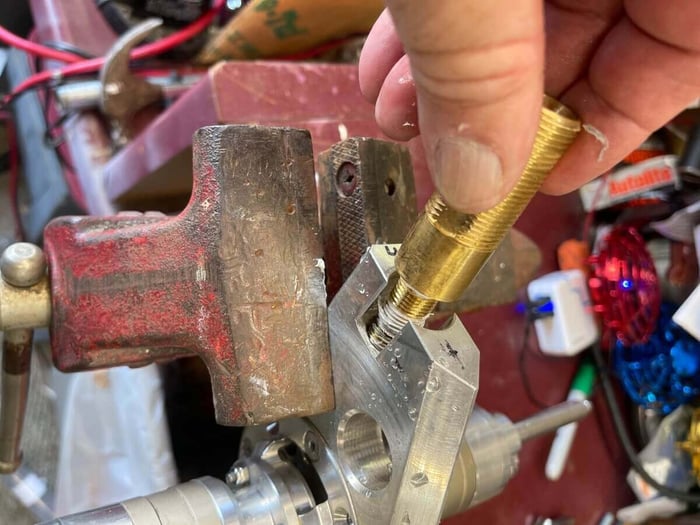 Removing the brass jet fitting from a ProTool water powered brush assembly