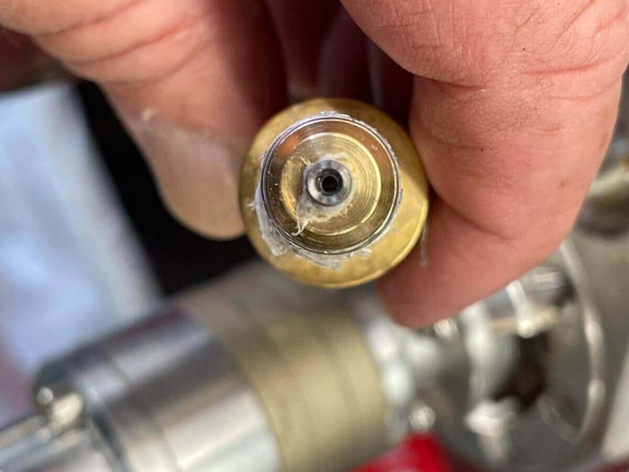 End view of the jet seated inside the brass fitting