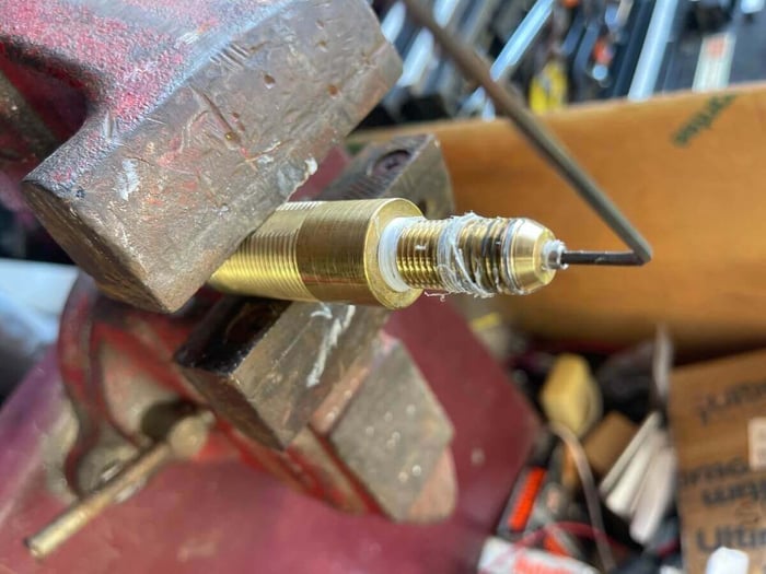 Allen wrench inserted to push the jet out of the brass fitting