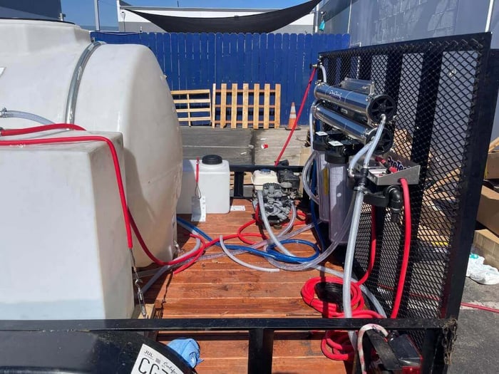 Pump and filter assembly on ProTool drone cleaning trailer