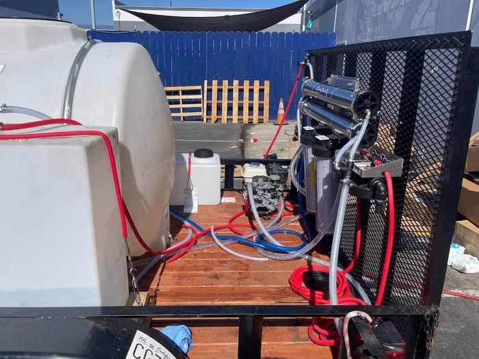 Pump and filter assembly on ProTool drone cleaning trailer