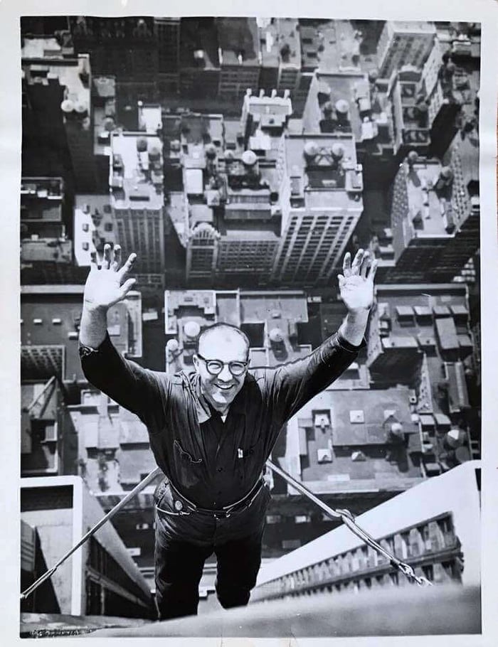 Historic high-rise window cleaners on a building facade, courtesy of Noa Pedersen