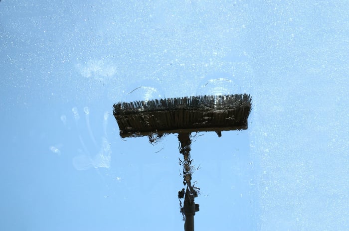 How to Clean Windows with a Water Fed Pole (Best Practices Guide)