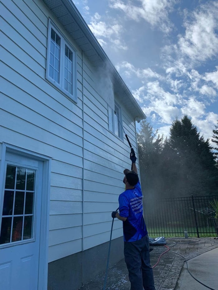 JRC University hands-on window cleaning workshop with students and instructor