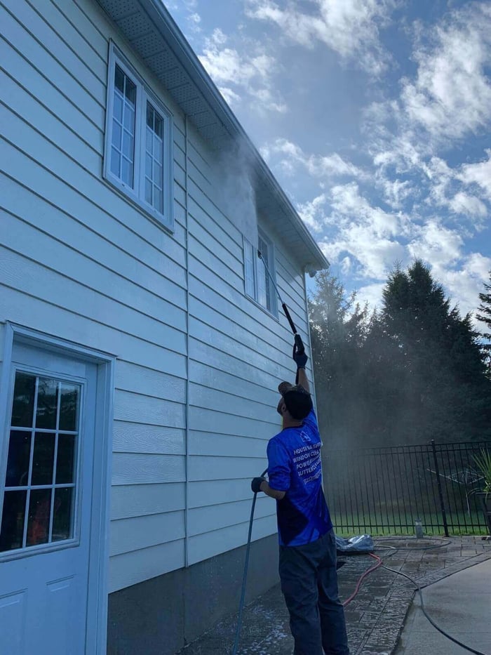 JRC University hands-on window cleaning workshop with students and instructor