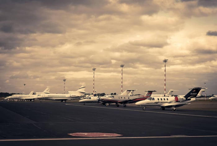 private jet owner receiving a personalized direct mail package, highlighting multi-channel outreach strategies