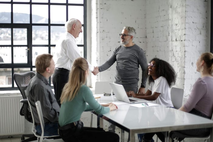 procurement professional analyzing a complex supply chain risk assessment report