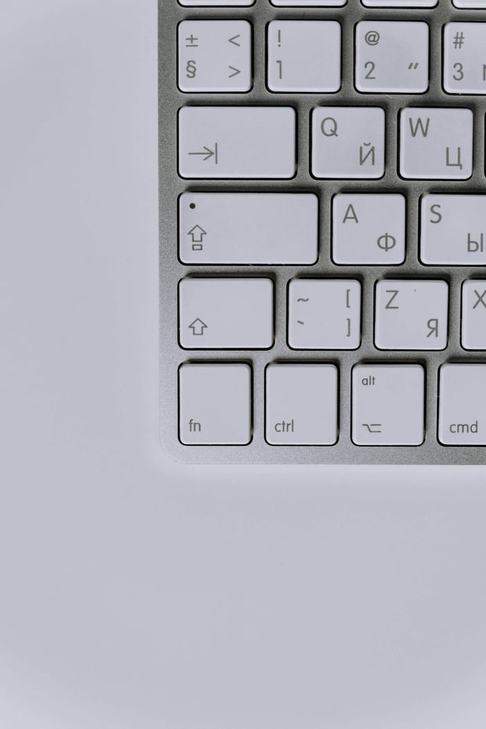 Close-up of a modern wireless keyboard showcasing minimalist design and functionality.