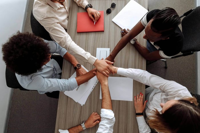 mid-market B2B sales team reviewing various outbound agency proposals for pipeline generation