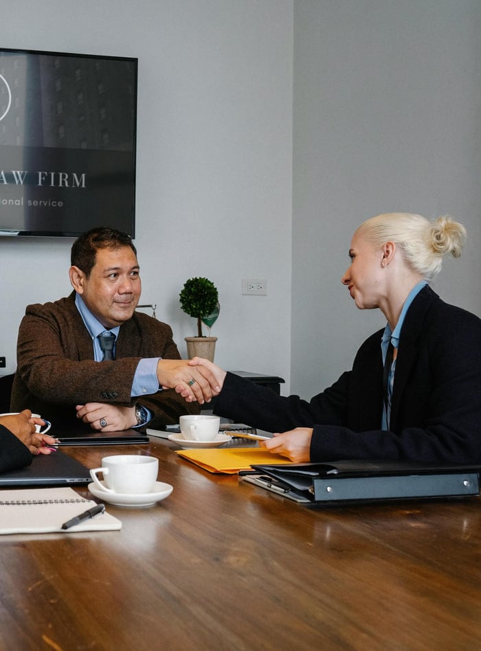 marketing team strategizing outbound email campaigns for enterprise sustainability clients