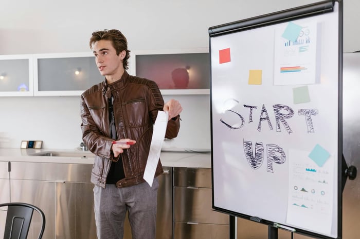 private equity executive discussing long-term relationship nurturing strategies with a founder