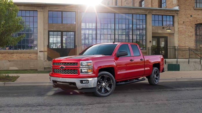 Red Chevy Silverado with four wheel drive option and crew cab, providing a surprisingly refined interior with Android Auto and various powertrain options.