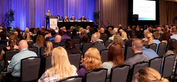 General business session taking place during APCO.