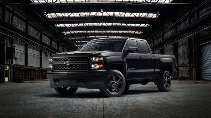 Black Chevy pickup truck, with advanced safety features, enhanced cargo capacity, and crew cab, perfect for truck enthusiasts