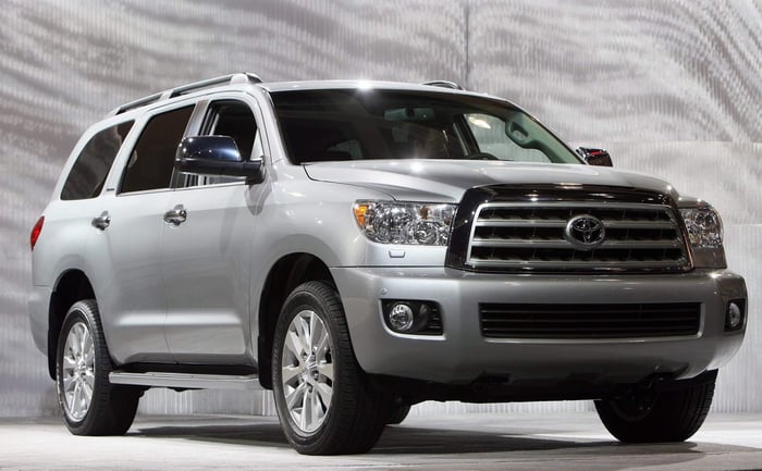 Best SUVs for towing- White Toyota Sequoia, full size SUV, available with four wheel drive, providing off road capability.