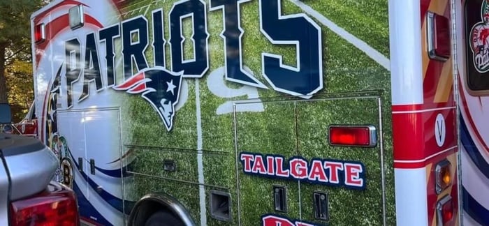 Eric Lahti shows off his football fandom with a New England Patriots outside wrap for his ambulance.