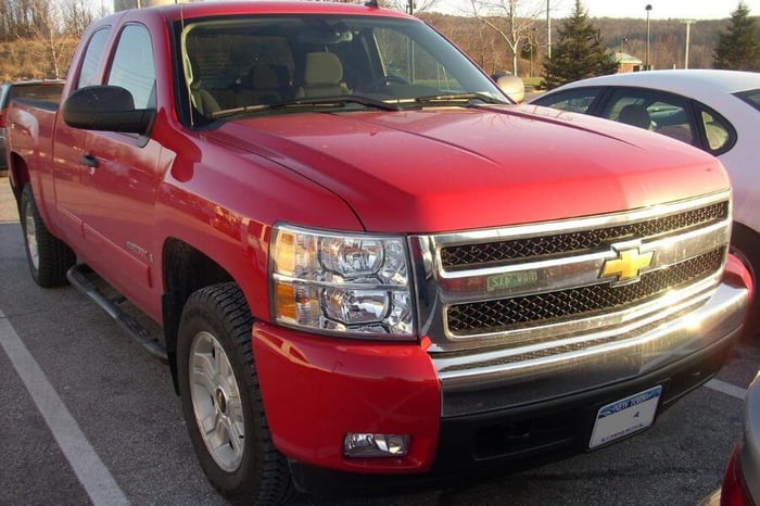 A Chevrolet Silverado parked in a lot.