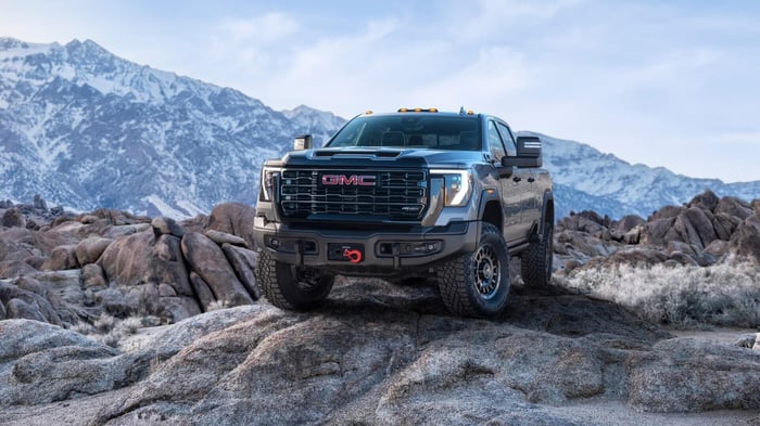 GMC Sierra 2500 HD driving in the mountains.