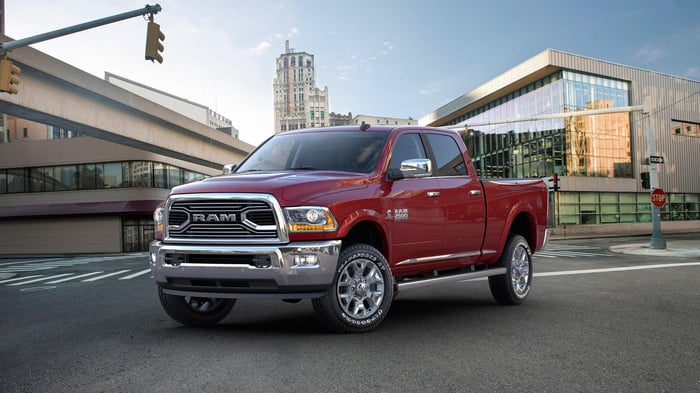 Ram 2500 driving in the street.