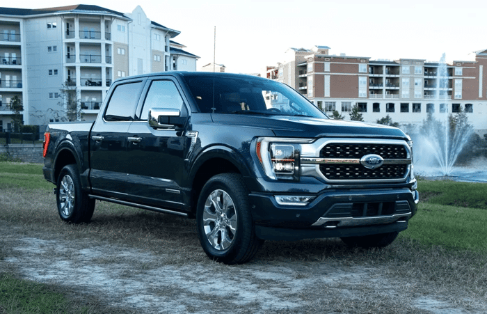 Black Ford F 150 vehicle that can carry an impressive amount of cargo and offers modern comforts for the driver.