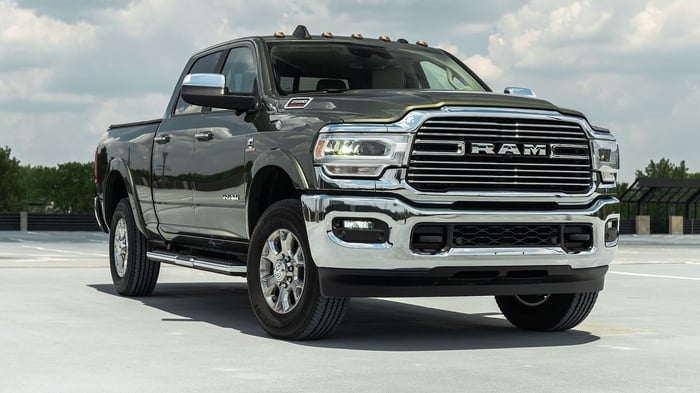 Black Ram truck with 6.4-liter HEMI V-8 engine, four wheels, brakes, and ability to carry up to max five passengers.