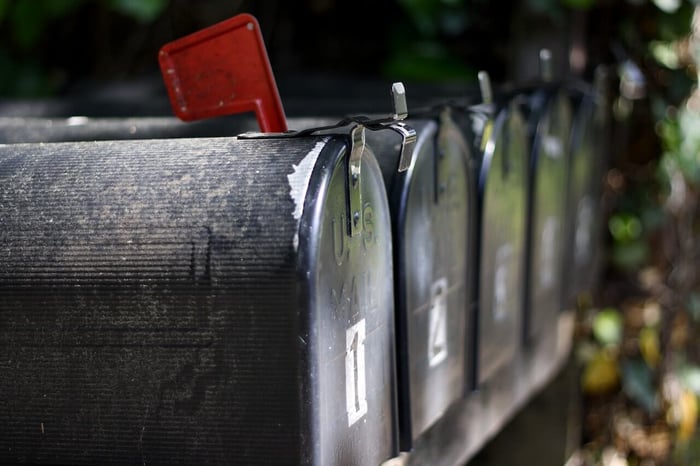 Line of mailboxes for direct mail.