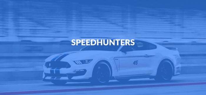 Best Automotive Sites - image of a white and black raceway speeding down track.