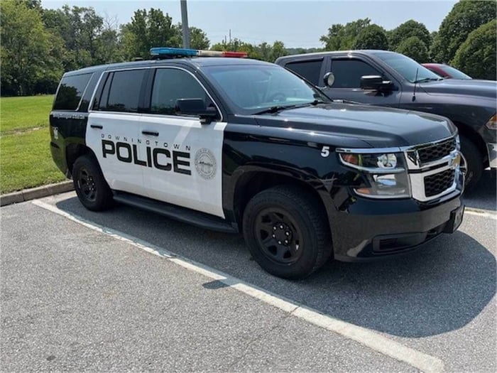 An image of a Chevrolet Tahoe retired police car.