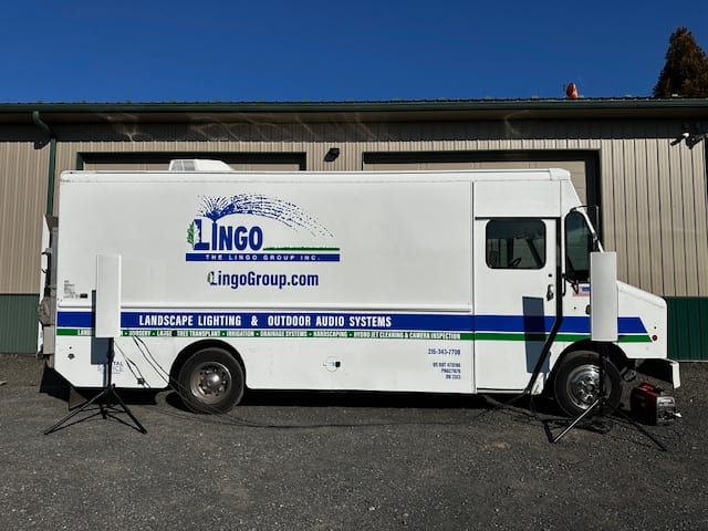 One of The Lingo Group's fleet vehicles at their nursery, complete with an audio setup.